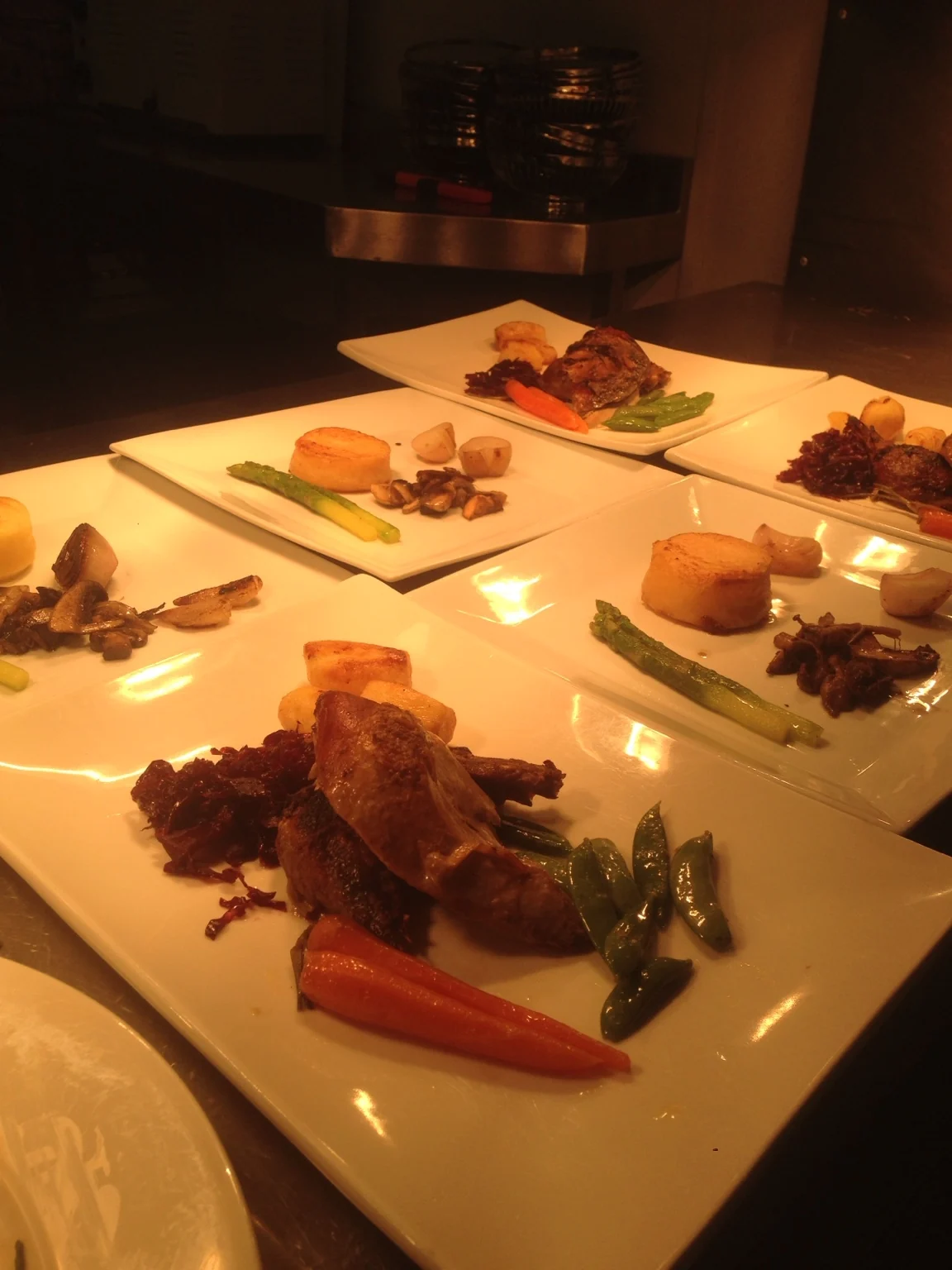 Multiple private dining plates ready for service